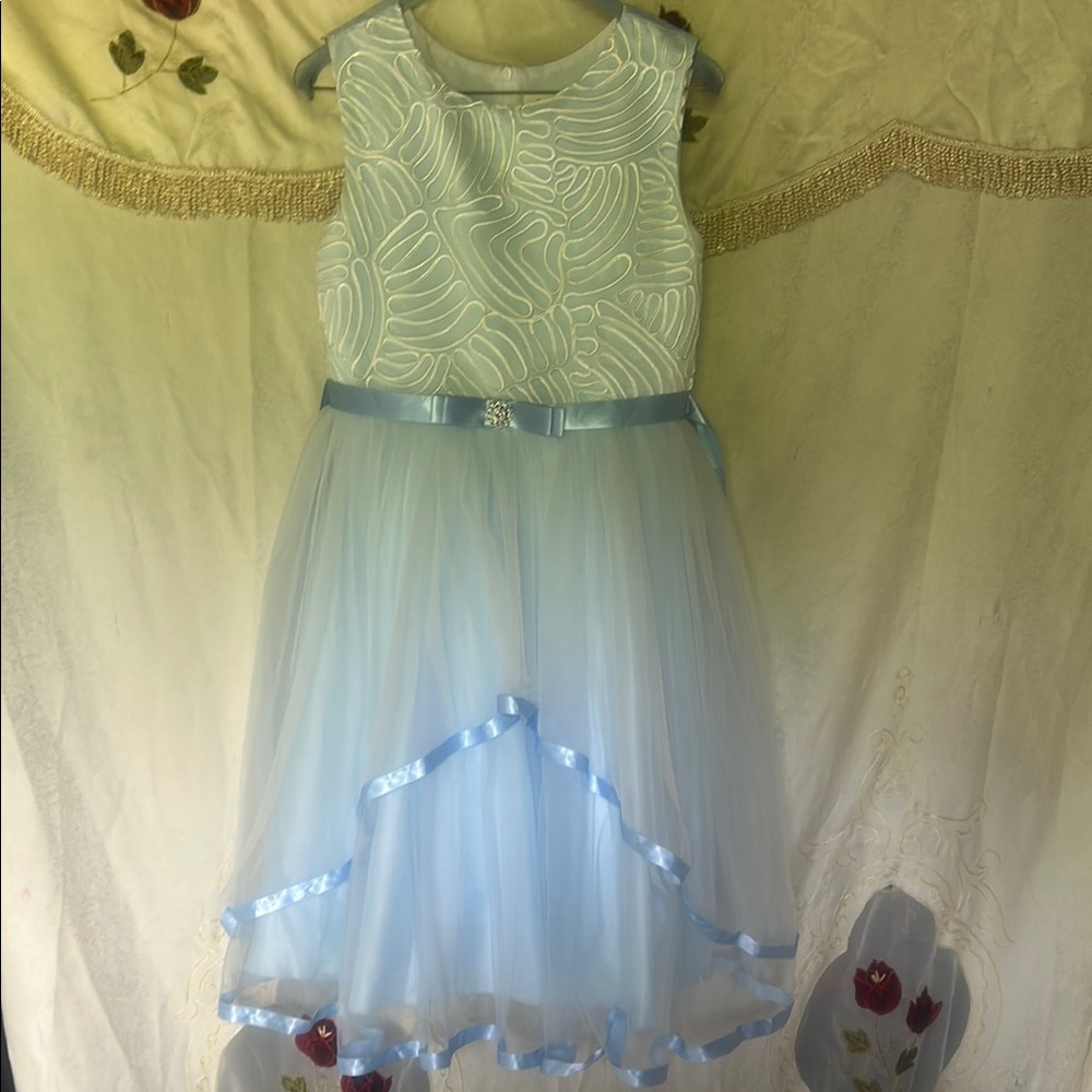 Light blue , girls formal dress. Worn only once . Size 14